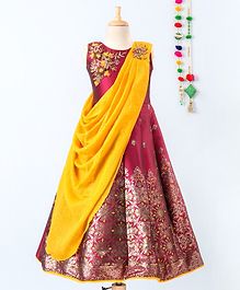Betty By Tiny Kingdom Sleeveless Floral Brocade Patch Flared Gown With Contrast Drape - Maroon Betty By Tiny Kingdom Sleeveless Floral Brocade Patch Flared Gown With Contrast Drape - Maroon
