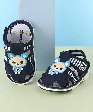 Cute Walk by Babyhug Slip On Musical Sandals with Velcro Closure & Teddy Applique - Navy Blue