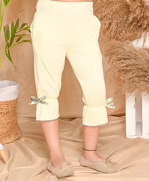 Kids Cave Three Fourth Length Bow Applique Gathered Detail Solid Capri Pants - Beige