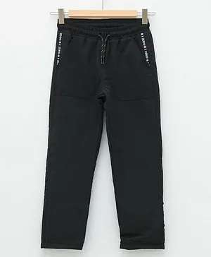 LC Waikiki Polyester Elastic Waist Placement Text Printed Fleece Lined Trousers   - Black