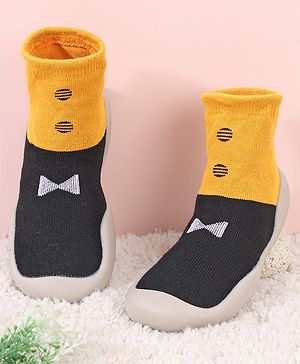 Cute Walk by Babyhug Slip On Sock Shoes Bow Design- Black Yellow & White