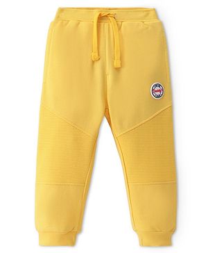 Babyhug Terry Knit Full Length Lounge Pant with Cut & Sew Design Solid Colour - Yellow