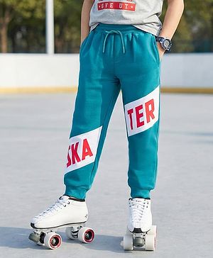 Pine Kids Full Length Track Pants Skater Print - Teal Blue