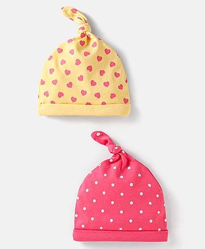 Babyhug Interlock Cotton Knit Heart & Polka Dot Printed Caps Pack Of 2 - Dark Pink & Yellow