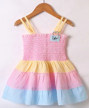 Dew Drops
                                  Cotton Woven Sleeveless Checks Frock
                                  With Smocked Yoke & Floral
                                  Applique - Blue (Trim May Vary)