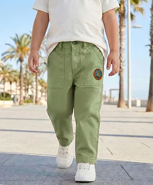 Babyhug Cotton Lycra Woven Full
                              Length Solid Coloured Trouser With Stretch
                              & Animal Patch - Olive Green