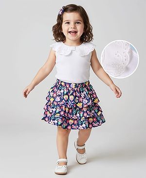 Babyhug Single Jersey Knit Sleeveless Schiffli Peter Pan Collar Top & Skirt Set With Floral Print & Bow Applique - White & Navy Blue