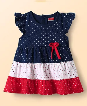 Babyhug 100% Cotton Interlock Knit
                              Frill Sleeves Frock Onesie with Cut &
                              Sew Design Polka Dot Print & Bow
                              Applique - Navy Blue Red & White