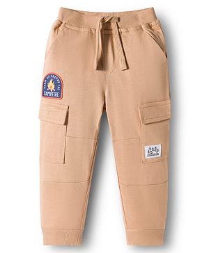 Babyhug French Terry Knit Full Length Lounge Pant With Text Badge - Cream