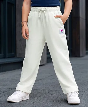 Kookie Kids Terry Knit Full Length
                              Solid Color Wide Leg Lounge Pant with
                              Badge Detailing - Offwhite