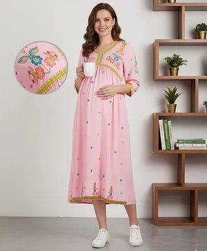 Bella Mama Woven Three Forth Sleeves
                              Floral Printed Yoke Maternity Dress With
                              Border Detailing - Pink