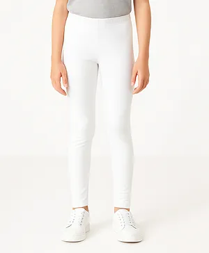 Charm n Cherish Cotton Blend Knit
                              Solid Leggings - White