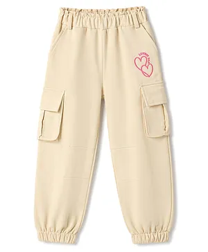 Honeyhap Premium 100% Cotton Looper
                              Knit Full Length Hearts Printed Lounge
                              Pant With Cargo Pockets & Bio Wash -
                              Peachy Keen