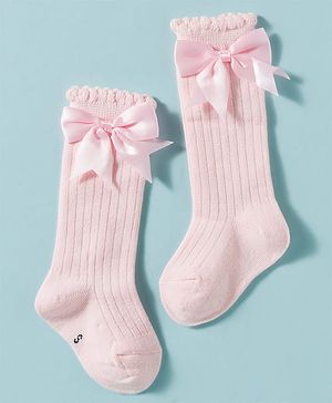 Cute Walk by Babyhug Non Terry Knit Calf Length Solid Party Socks with Bow Applique & Cable Knit Design - Pink