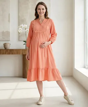 Bella Mama Woven Three Fourth Sleeves
                              Solid Maternity Dress With Lace Detailing
                              - Peach