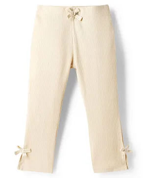 Babyhug
                              Lycra Knit Full Length Striped Leggings
                              With Bow Applique - Beige