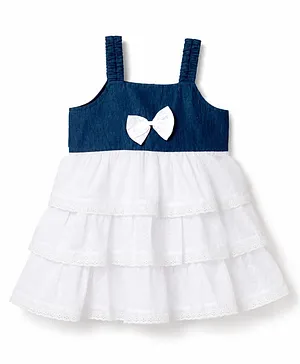 Babyhug Cotton Woven Sleeveless
                                  Layered Frock With Bow Applique - Navy
                                  Blue & White