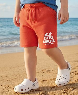 Babyhug Terry Knit Mid Thigh Length Shorts with Little Surfer Print - Red
