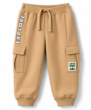 Babyhug Cotton Terry Knit Track Pant with Explore Text & Cargo Pocket in Cream