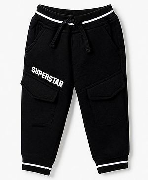 Babyhug Cotton Terry Full Length Track Pant with Superstar Text Print - Black