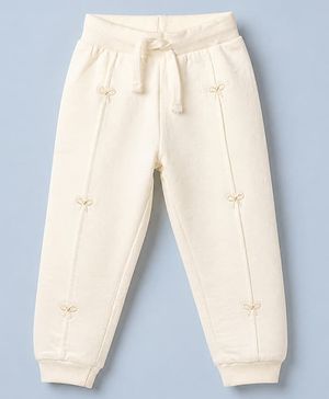 Babyhug Cotton Knit Full Length Jogger Fit Lounge Pant With Bows Embroidery in Cream