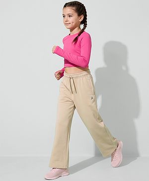 Pine Active Knit Full Length Solid Flared Track Pants in Beige