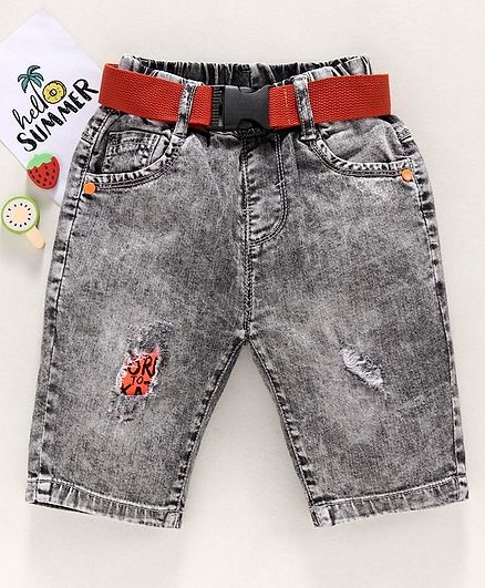 grey ripped shorts