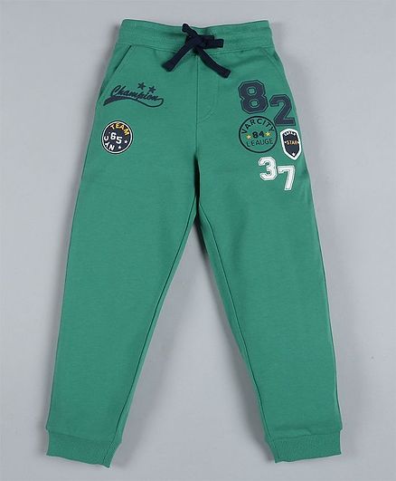 green champion track pants
