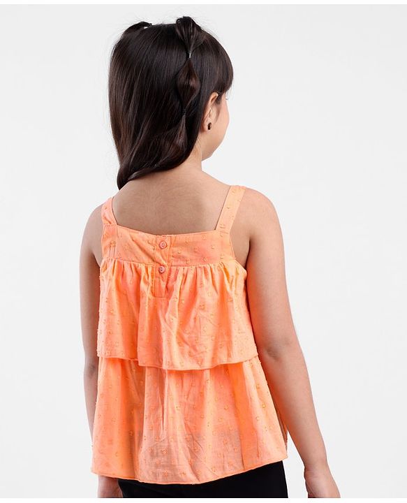 Babyhug Sleeveless Swiss Dot Woven Top With Bow & Frill Detailing - Peach