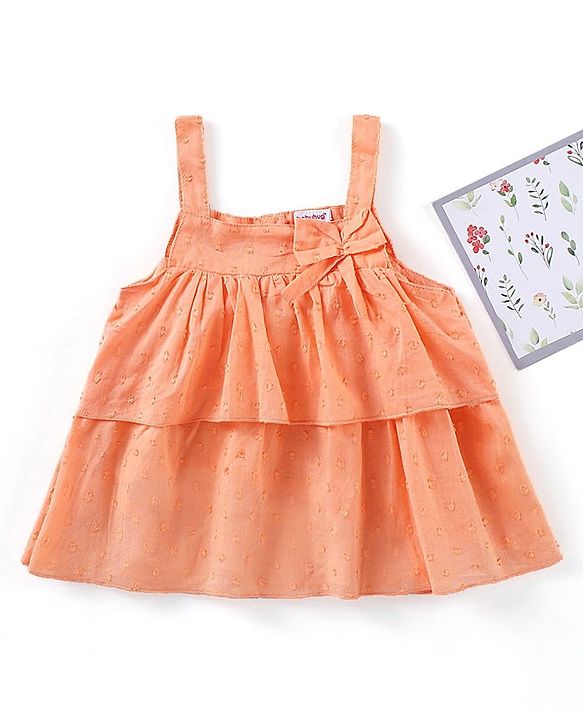 Babyhug Sleeveless Swiss Dot Woven Top With Bow & Frill Detailing - Peach