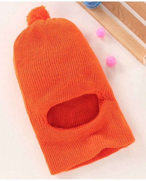 Babyhug Woollen Monkey Cap With Pom Pom Solid Orange- 10.5 cm