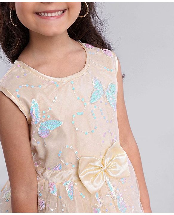 Babyhug Sleeveless Party Wear Mesh Frock With Sequin Embroidery & Bow Applique- Ivory