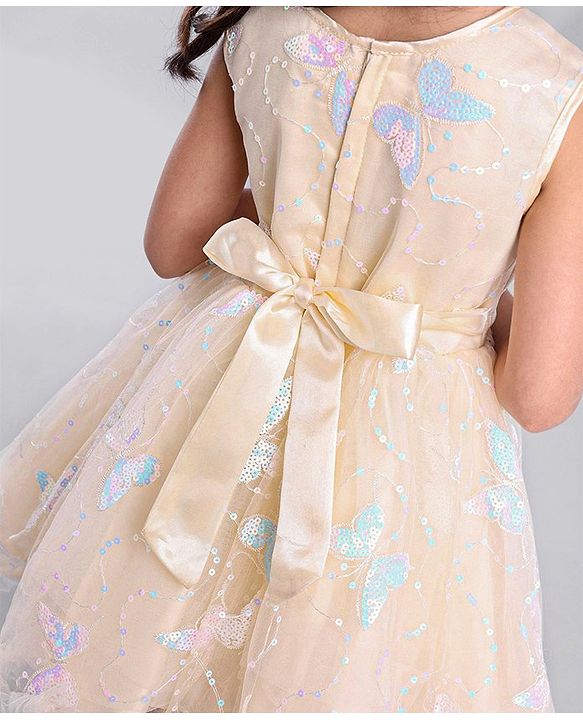 Babyhug Sleeveless Party Wear Mesh Frock With Sequin Embroidery & Bow Applique- Ivory