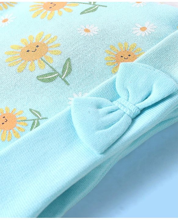 Babyhug 100% Cotton Cap Sun Flower Printed with Bow Applique  Blue - Diameter 9 Cm