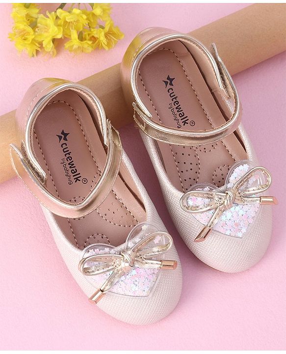 Cute Walk by Babyhug Velcro Closure Shimmer Striped Bellies with Bow Applique - Pink