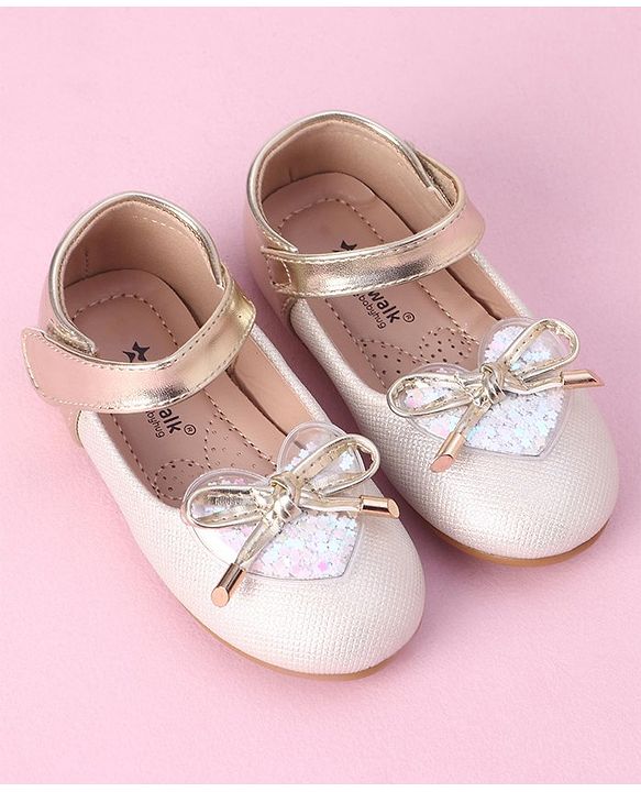 Cute Walk by Babyhug Velcro Closure Shimmer Striped Bellies with Bow Applique - Pink