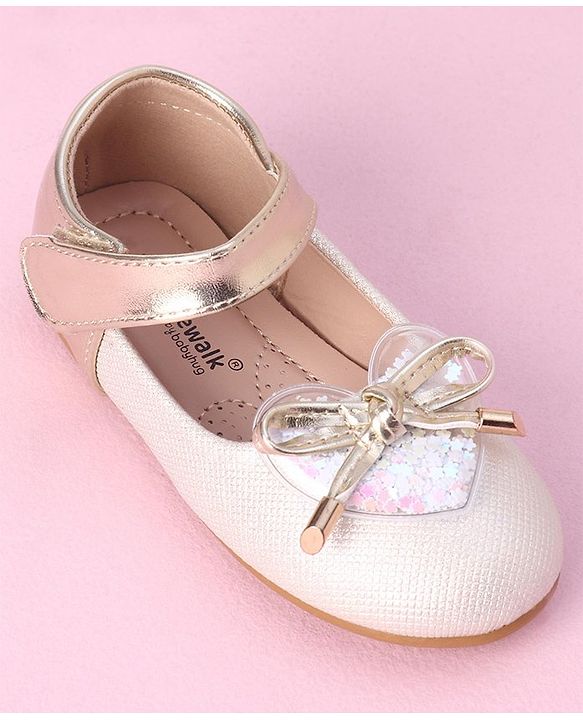 Cute Walk by Babyhug Velcro Closure Shimmer Striped Bellies with Bow Applique - Pink