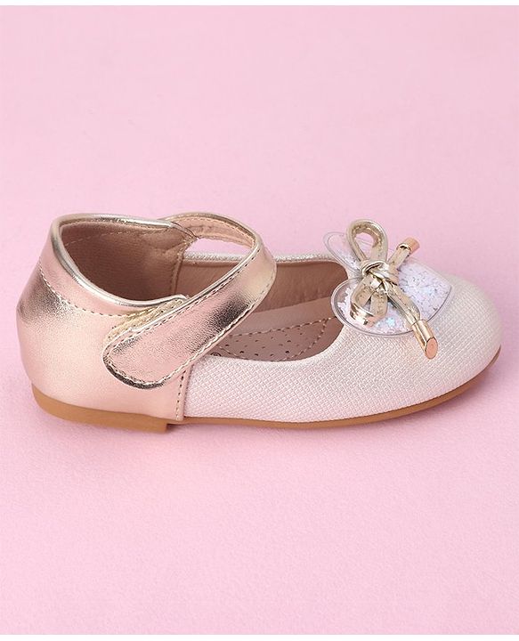 Cute Walk by Babyhug Velcro Closure Shimmer Striped Bellies with Bow Applique - Pink