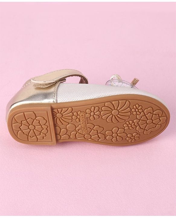 Cute Walk by Babyhug Velcro Closure Shimmer Striped Bellies with Bow Applique - Pink