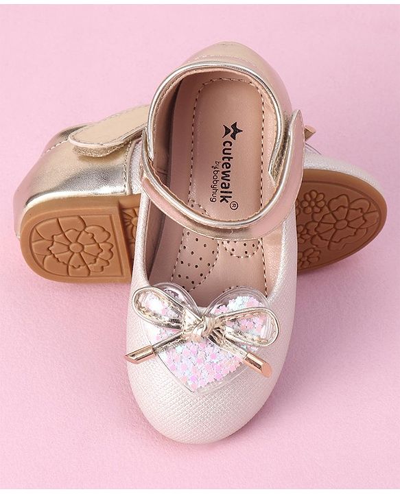 Cute Walk by Babyhug Velcro Closure Shimmer Striped Bellies with Bow Applique - Pink