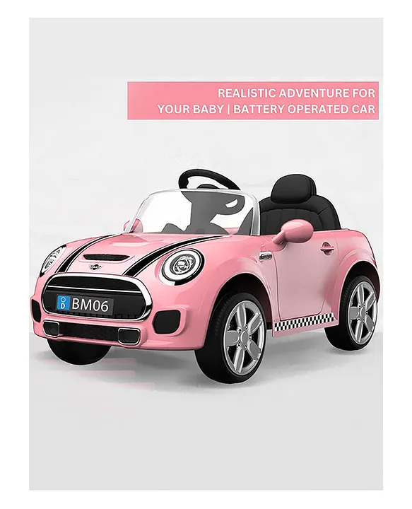 Pink mini cooper ride sales on