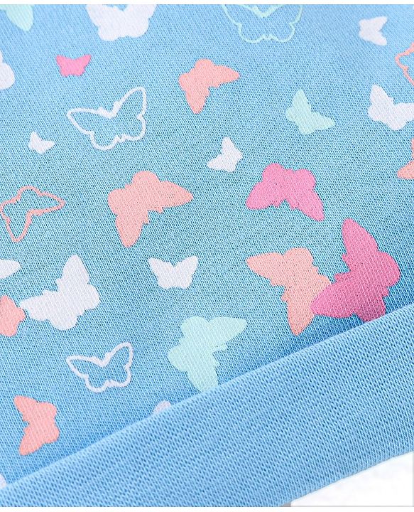 Babyhug 100% Cotton Knit Butterfly Print Cap With Bow Applique - Blue