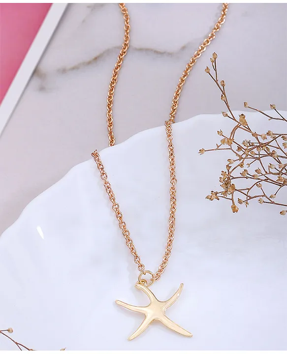 Elsa Peretti™ Starfish pendant in 18k gold. | Tiffany & Co.