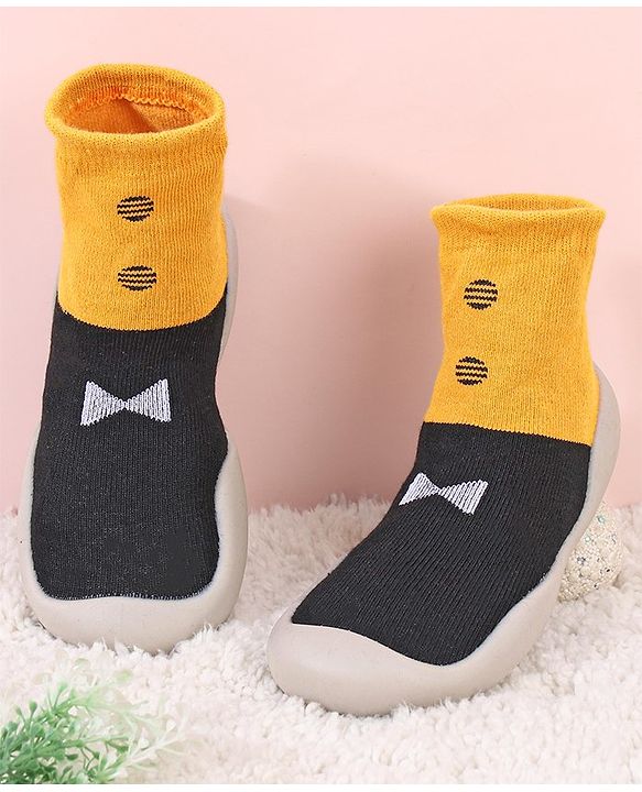 Cute Walk by Babyhug Slip On Sock Shoes Bow Design- Black Yellow & White