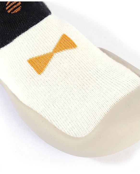 Cute Walk by Babyhug Slip On Sock Shoes Bow Design- Black Yellow & White