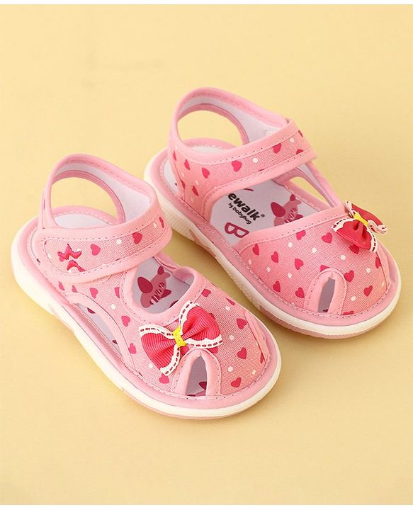 Cute Walk by Babyhug Velcro Closure Musical Sandals with Heart Print & Bow - Pink