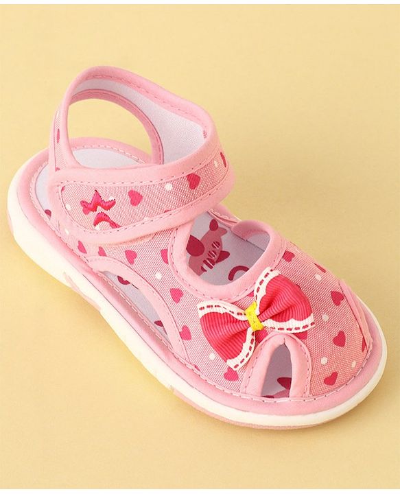 Cute Walk by Babyhug Velcro Closure Musical Sandals with Heart Print & Bow - Pink