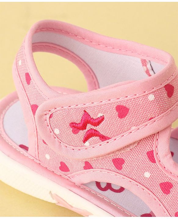 Cute Walk by Babyhug Velcro Closure Musical Sandals with Heart Print & Bow - Pink