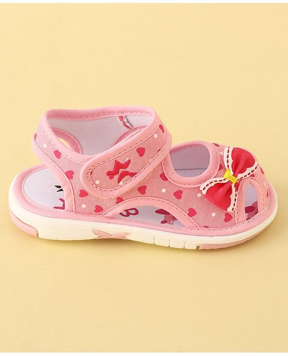 Cute Walk by Babyhug Velcro Closure Musical Sandals with Heart Print & Bow - Pink