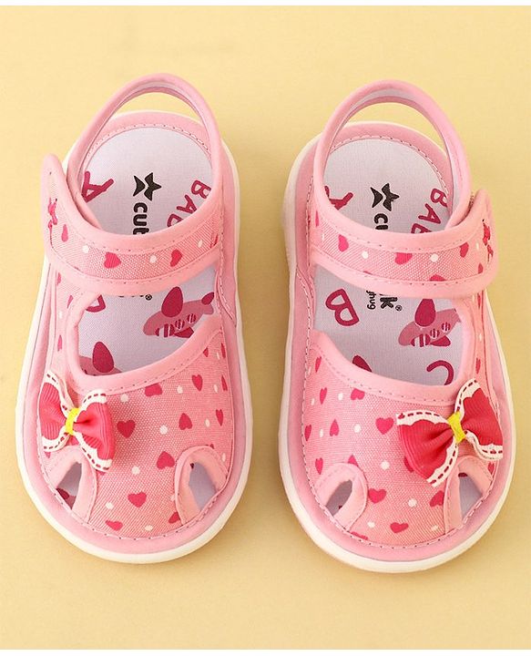 Cute Walk by Babyhug Velcro Closure Musical Sandals with Heart Print & Bow - Pink
